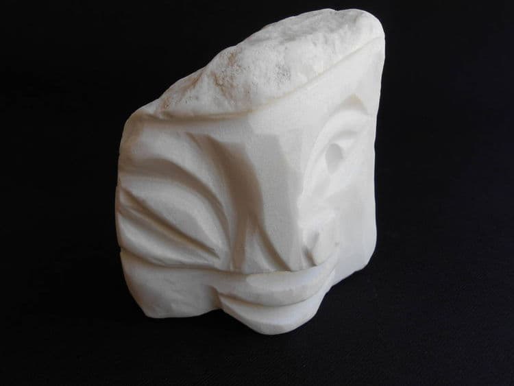 IN THE PALM OF YOUR HAND Winking White - Hero Image